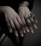 finger tattoos by guy le tattooer