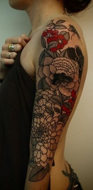 flower tattoo arm sleeve by guy le tattooer