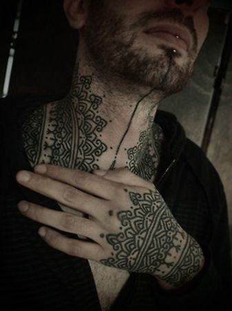 hand and neck ornamental tattoos by guy le tattooer