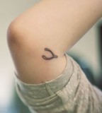tiny wishbone tattoo