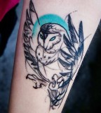 Angry owl tattoo