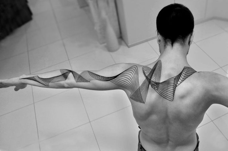 Armand shoulder tattoo by Chaim Machlev