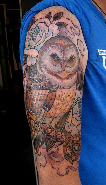 Big brown owl tattoo