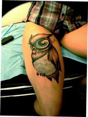 Big eyes owl tattoo