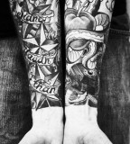 Black and whit arm tattoos