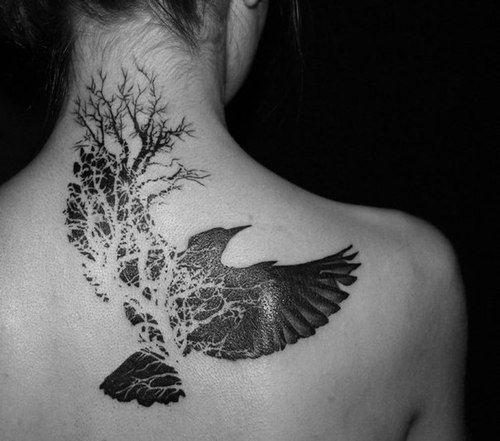 Black and white bird tattoo