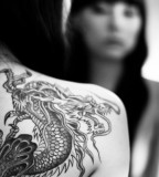 Black and white dragon tattoo