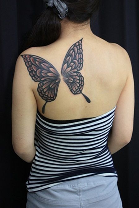 Black butterfly tattoo