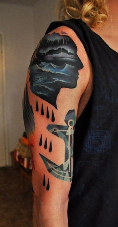 Blue man tattoo by Marcin Aleksander Surowiec