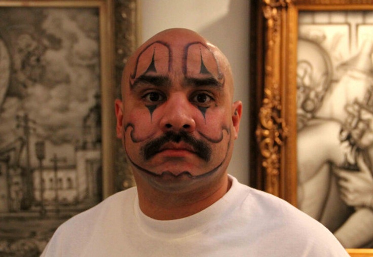 Clown face tattoo