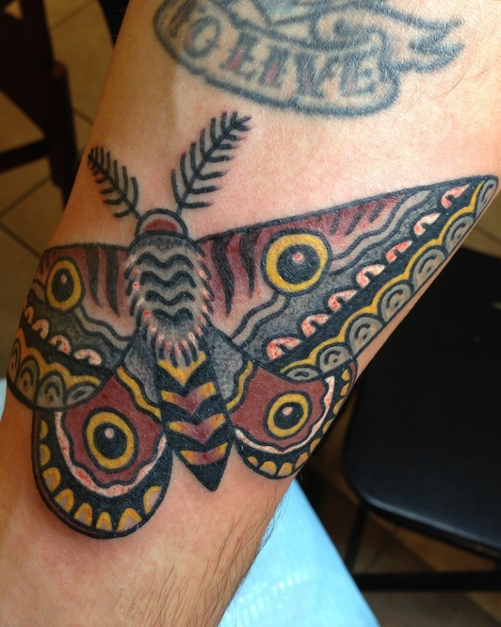 Colorful tattoos by Andy Perez butterfly