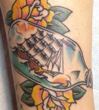 Colorful tattoos by Andy Perez  ship in the bottle