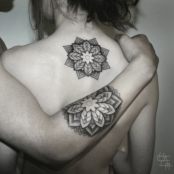 Couple flowers tattoo by Chaim Machlev