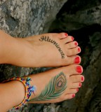 Feather tattoo on foot