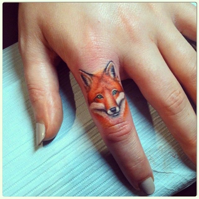 Finger fox tattoos