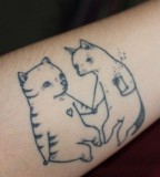 Friendly cats tattoo