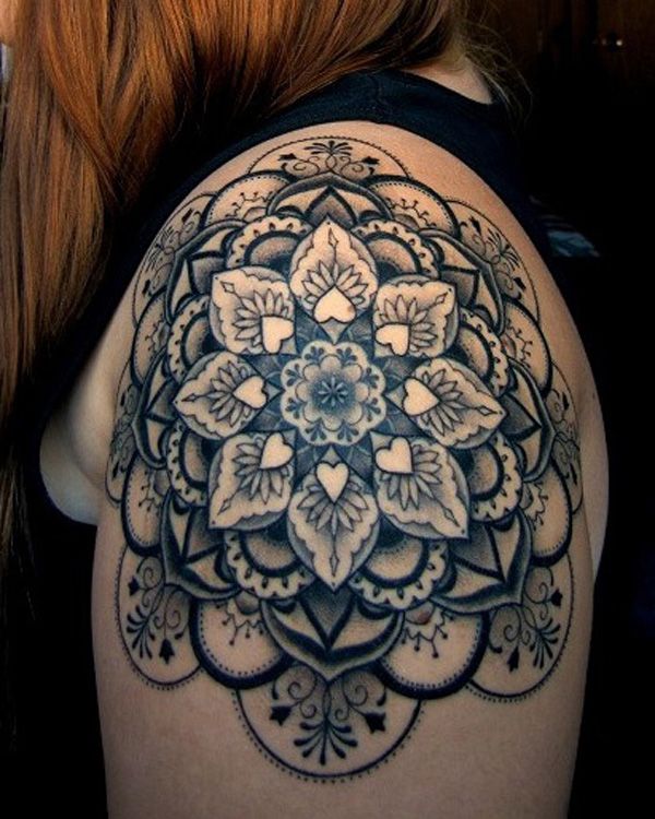 Geometric flowers shoulder tattoo