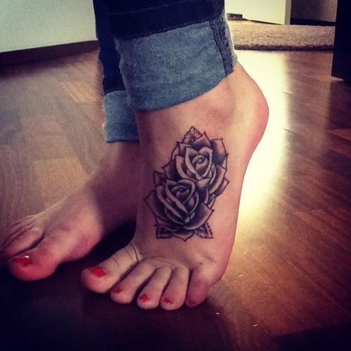 Great flowers foot tattoo