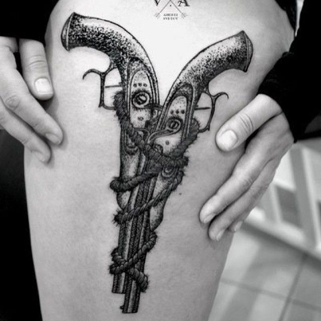 Gun tattoo by Andrey Svetov