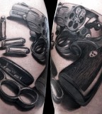 Gun tattoo by Matteo Pasqualin