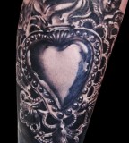 Heart tattoo by Matteo Pasqualin