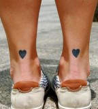 Legs heart tattoo