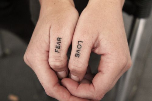 Love and fear fingers tattoo