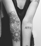 Mandala geometric flowers tattoo