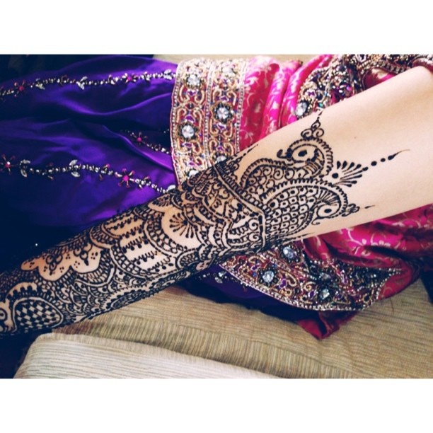 Mehendi style tattoos