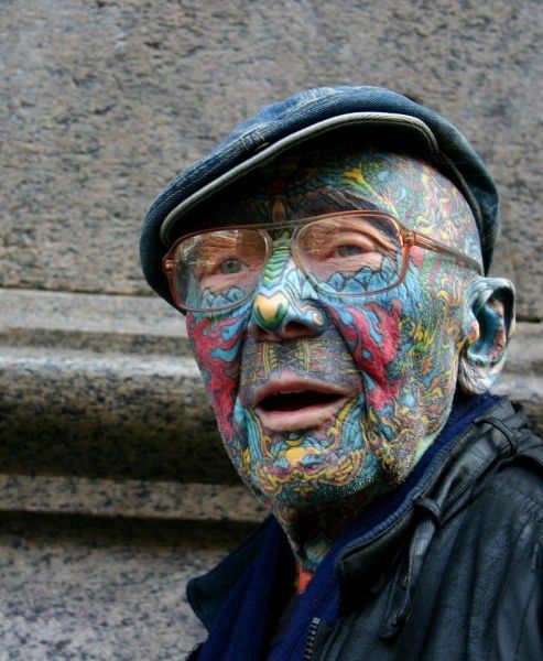 Old man colorful face tattoo