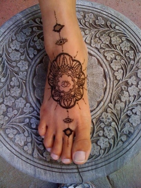 Ornaments foot tattoo