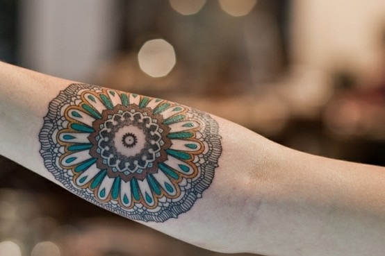 Round and colorful Mandala tattoo