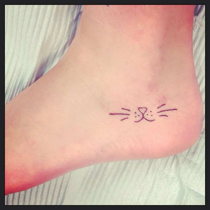 Small foot cat tattoo