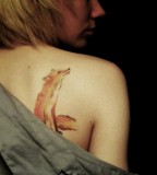 Watercolor fox tattoos on shoulder