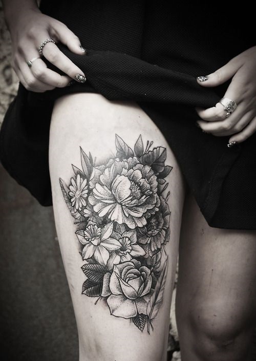 alex tabuns floral thigh tattoo