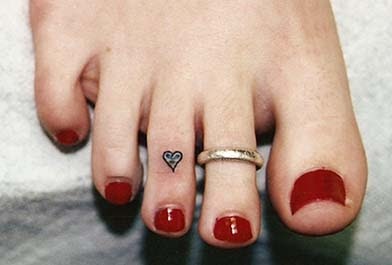 beautiful tattoo placement tiny heart on toe