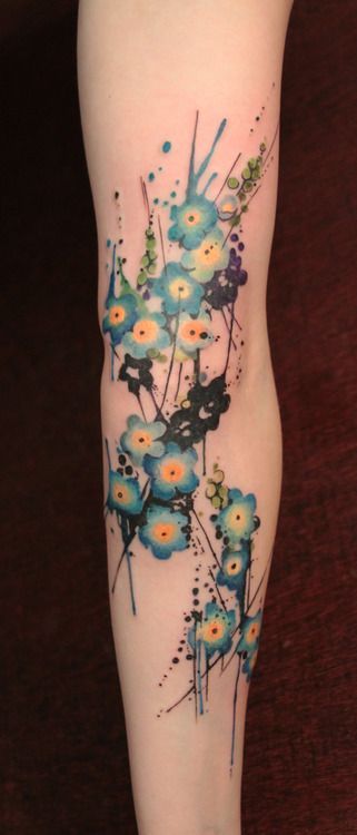 blu flowers tattoo
