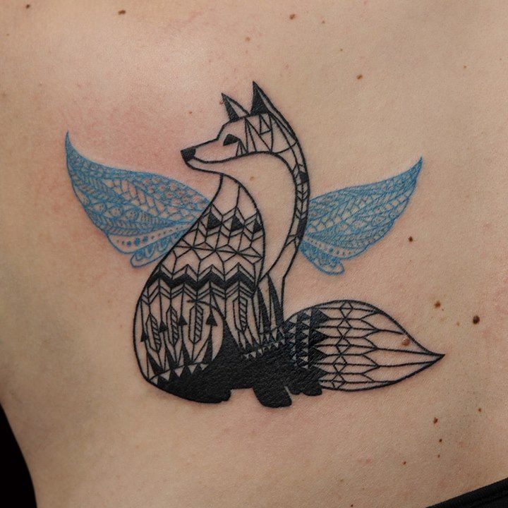 blue ink tattoo black fox with blue wings