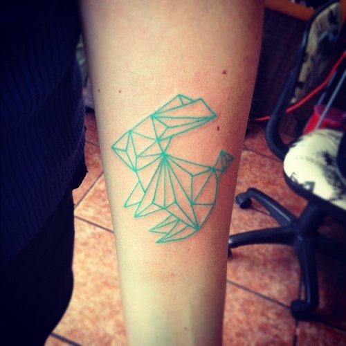 blue ink tattoo geometric light blue rabbit