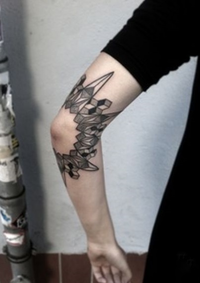 crystal tattoo around elbow