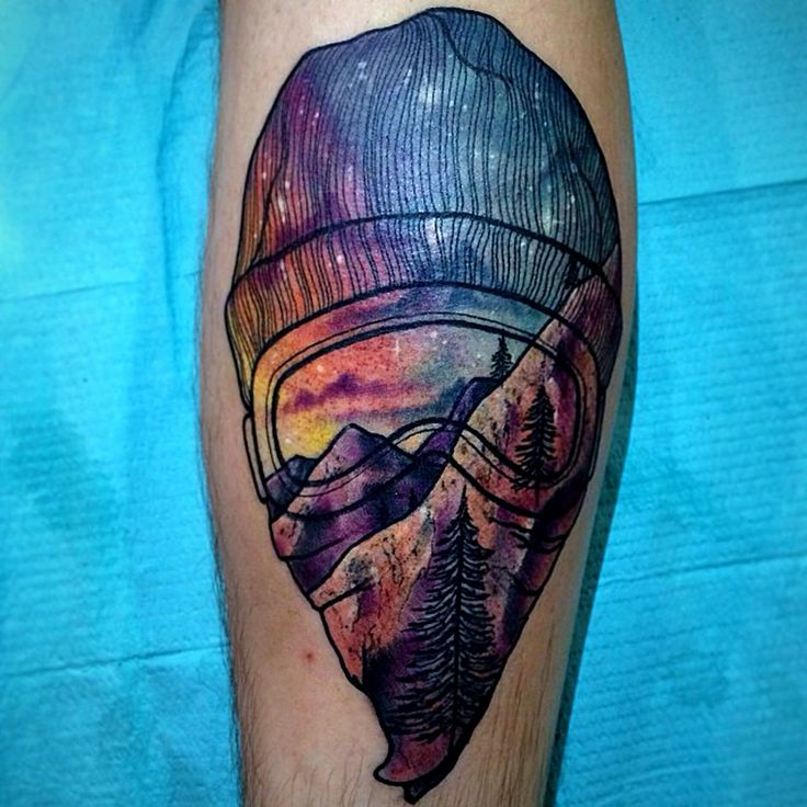 crystal tattoo mountains reflection on face