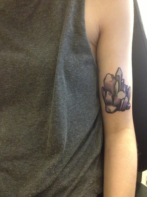 crystal tattoo on upper arm