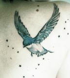 girly tattoo bird and stars