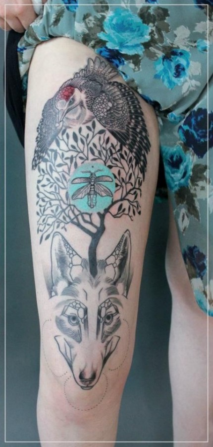 jessica mach tattoo bird tree and wolf composition on leg