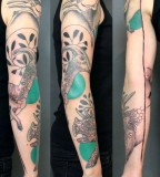 jessica mach tattoo black and green arm sleeve