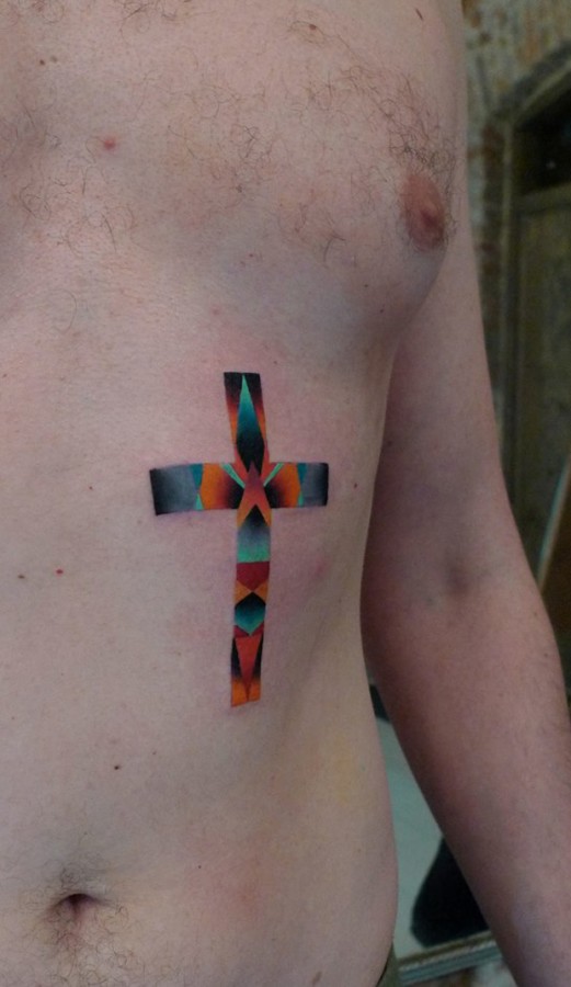 mariusz trubisz cross tattoo