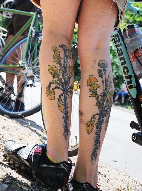 nature tattoo dandelion on legs