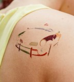 pop art tattoo car silhouette on shoulder