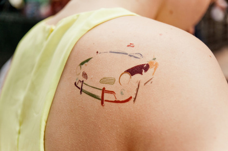 pop art tattoo car silhouette on shoulder