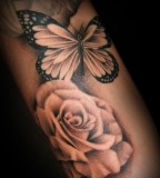 rose and  butterfly tattoo